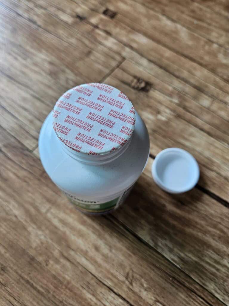 프리저비전 아레즈2 뚜껑 아래 "SEALED FOR YOUR PROTECTION" 안전 봉인 확인
